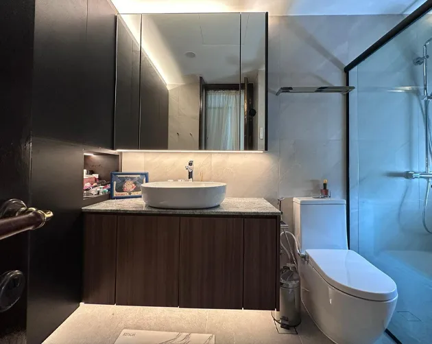 Vanity cabinet under bathroom sink with storage drawers customised by San Mu in Singapore condo