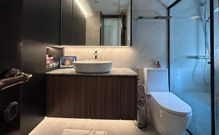 Vanity cabinet under bathroom sink with storage drawers customised by San Mu in Singapore condo