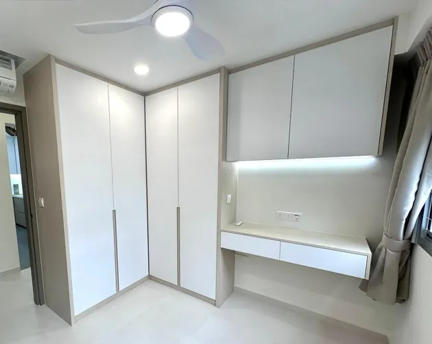 Custom-built sliding door wardrobe for bedroom by San Mu carpentry renovation, Singapore
