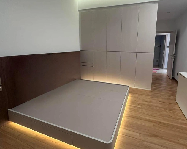 Custom wardrobe with open shelving and hanging space by San Mu interior design Singapore